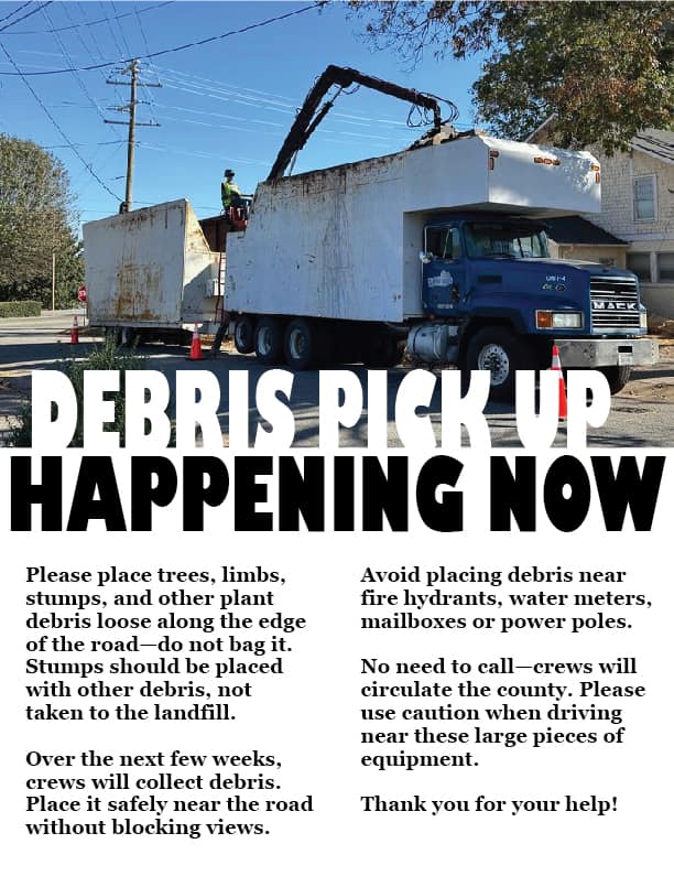 Debris pickup notice showing cleanup crews collecting storm debris with safety guidelines for residents