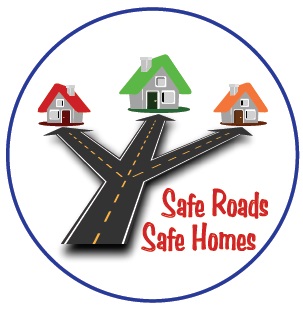 Safe Roads Safe Homes logo showing three houses connected by a roadway inside a blue circle